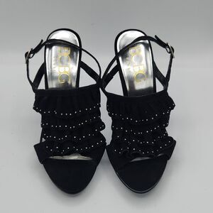 BCBG Paris Black leather upper ruffle metal silver studs Ankle strap stilettos
